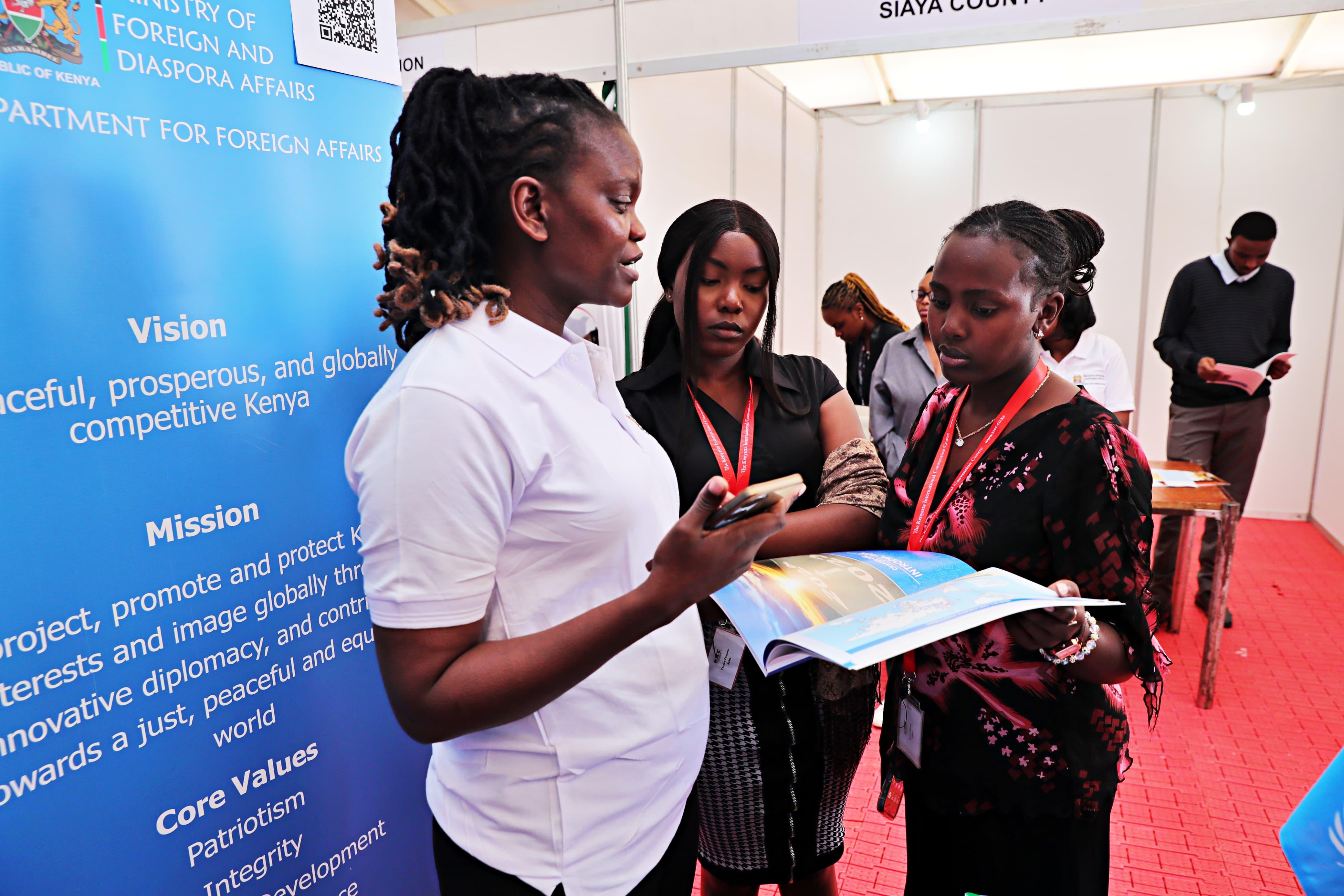 SDFA staff engaging with the public at the booth