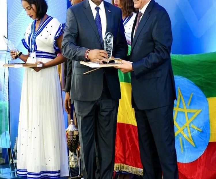 Ambassador George M. Orina, Ambassador/ Permanent Representative receive an award from Hon. Temesgen Tiruneh, the Deputy Prime Minister of the Federal Democratic Republic of Ethiopia.